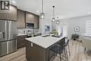 143 Sharma Lane, Saskatoon, SK  - Indoor Photo Showing Kitchen With Stainless Steel Kitchen With Double Sink With Upgraded Kitchen 