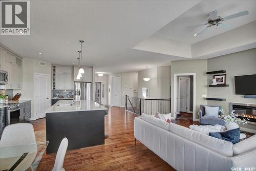 22 315 Ledingham Drive, Saskatoon, SK - Indoor With Fireplace