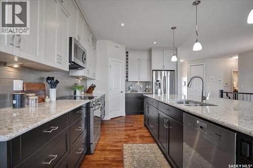 22 315 Ledingham Drive, Saskatoon, SK - Indoor Photo Showing Kitchen With Stainless Steel Kitchen With Double Sink With Upgraded Kitchen