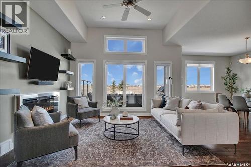 22 315 Ledingham Drive, Saskatoon, SK - Indoor Photo Showing Living Room With Fireplace