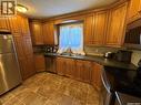 805 Souris Avenue, Weyburn, SK  - Indoor Photo Showing Kitchen With Double Sink 