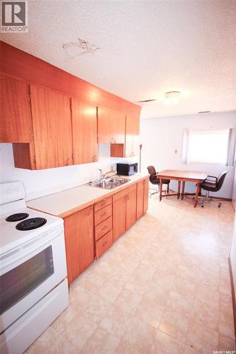 8241 Range Road, Shaunavon, SK - Indoor Photo Showing Kitchen With Double Sink