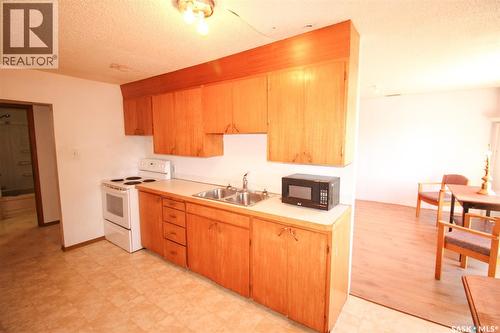 8241 Range Road, Shaunavon, SK - Indoor Photo Showing Kitchen With Double Sink