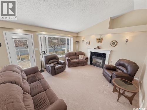 530 Palliser Drive, Swift Current, SK - Indoor Photo Showing Living Room With Fireplace