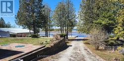 Driveway To Cement Boat Launch - 