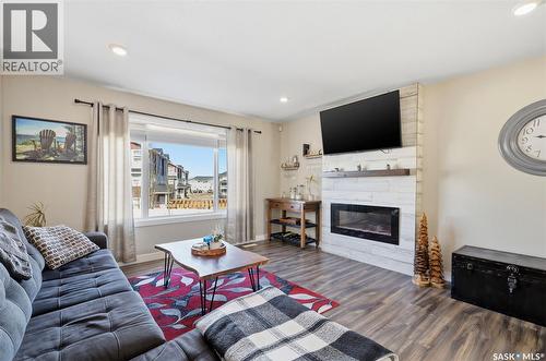 1047 Kolynchuk Crescent, Saskatoon, SK - Indoor Photo Showing Living Room With Fireplace