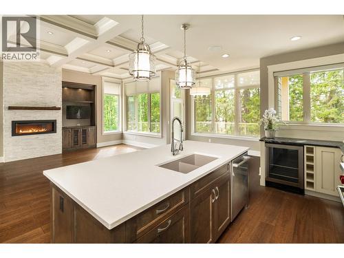4149 Gallaghers Fairway S, Kelowna, BC - Indoor Photo Showing Kitchen With Fireplace With Double Sink With Upgraded Kitchen