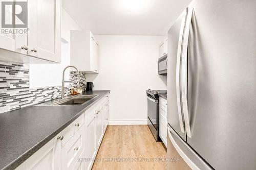 203 - 573 Armstrong Road, Kingston (East Gardiners Rd), ON - Indoor Photo Showing Kitchen With Stainless Steel Kitchen With Upgraded Kitchen