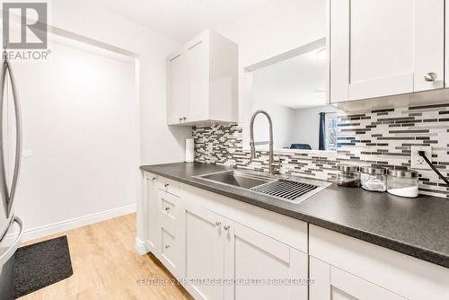 203 - 573 Armstrong Road, Kingston (East Gardiners Rd), ON - Indoor Photo Showing Kitchen With Double Sink