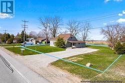 With double wide lot offering excellent exposure. - 