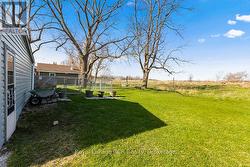 Large, level backyard green space for 'play' - 