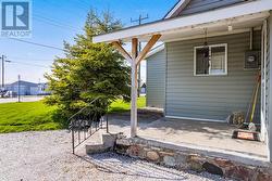 Convenient covered front porch entry. - 