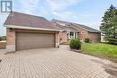 2 car garage & an inviting front porch - 1229 Morton Line, Cavan Monaghan (Cavan Twp), ON  - Outdoor 