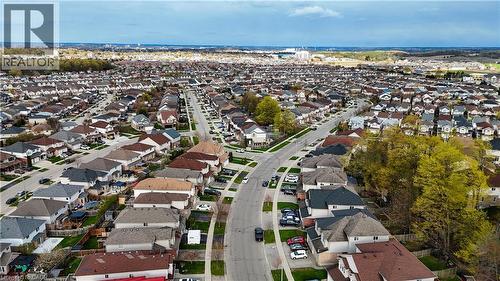 Sprawling residential development featuring a grid of paved streets and numerous detached homes - 569 Activa Avenue, Kitchener, ON - Outdoor With View