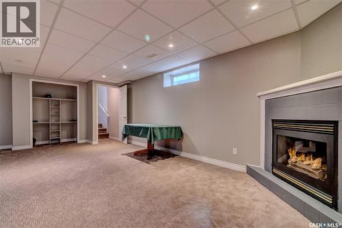 6343 Hird Crescent, Regina, SK - Indoor Photo Showing Basement With Fireplace
