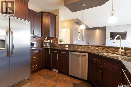 159 Masuda Terrace, Saskatoon, SK - Indoor Photo Showing Kitchen With Stainless Steel Kitchen With Double Sink