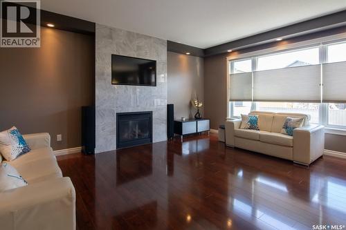 159 Masuda Terrace, Saskatoon, SK - Indoor Photo Showing Living Room With Fireplace