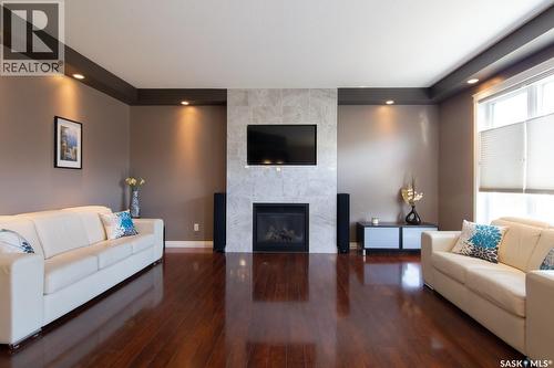 159 Masuda Terrace, Saskatoon, SK - Indoor Photo Showing Living Room With Fireplace