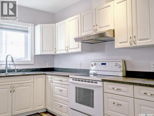 204 2Nd Avenue W, Biggar, SK - Indoor Photo Showing Kitchen With Double Sink
