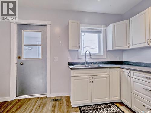 204 2Nd Avenue W, Biggar, SK - Indoor Photo Showing Kitchen With Double Sink