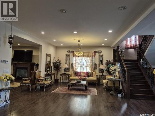 319 Roy Crescent, Saskatoon, SK - Indoor Photo Showing Living Room With Fireplace