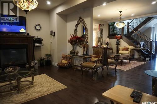 319 Roy Crescent, Saskatoon, SK - Indoor Photo Showing Other Room With Fireplace
