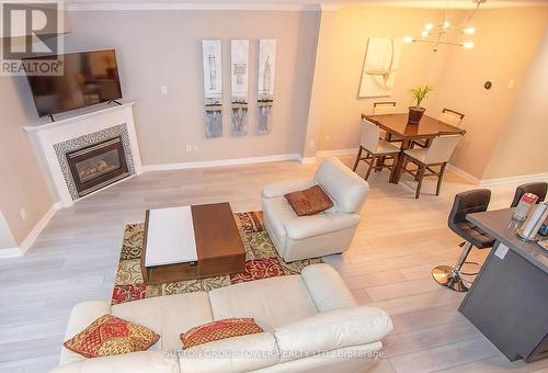 1501 - 15 Sudbury Street, Toronto, ON - Indoor Photo Showing Living Room With Fireplace