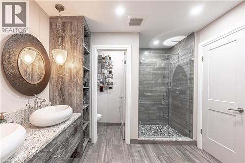 Bathroom with a shower stall, visible vents, a sink, and ceramic tile finished floors - 477 Blair Creek Drive, Kitchener, ON - Indoor Photo Showing Bathroom