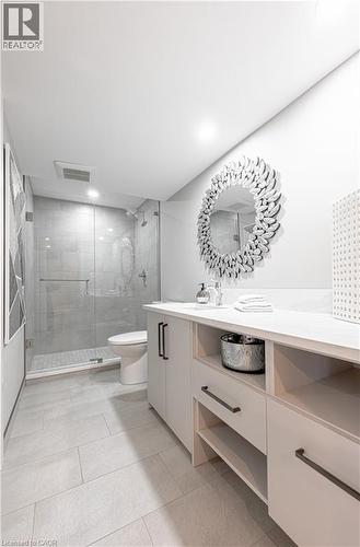 Full bathroom with vanity, a stall shower, tile patterned floors, toilet, and visible vents - 477 Blair Creek Drive, Kitchener, ON - Indoor Photo Showing Bathroom
