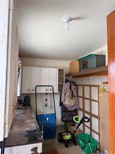 workshop at the back of the garage - 229 Swan River Drive, Swan River, MB - Indoor Photo Showing Other Room