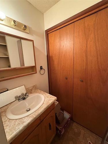 Single sink by back dr - 229 Swan River Drive, Swan River, MB - Indoor Photo Showing Bathroom