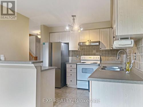 Upper - 26 Millcliff Circle, Aurora, ON - Indoor Photo Showing Kitchen With Double Sink
