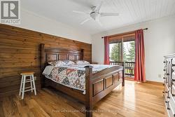 Primary Bedroom with W/O to another Muskoka Room - 