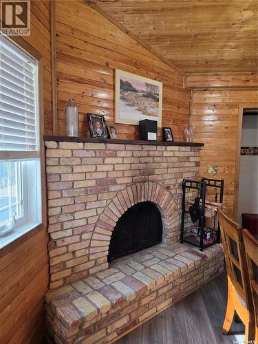 539 Mistusinne Crescent, Mistusinne, SK - Indoor With Fireplace