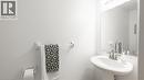 Half bath featuring a sink and toilet - 85 Bankside Drive Unit# E34, Kitchener, ON  - Indoor Photo Showing Bathroom 