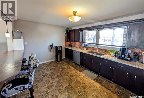 102 Mollard Crescent, Regina, SK - Indoor Photo Showing Kitchen With Double Sink