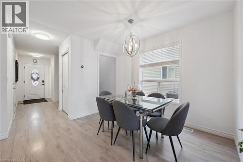 Bright interior showcasing light wood-finish flooring throughout - 11 Patton Drive, Cambridge, ON - Indoor Photo Showing Dining Room