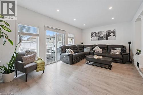 Spacious living area featuring light wood-finish flooring, recessed lighting, and white walls - 11 Patton Drive, Cambridge, ON - Indoor Photo Showing Living Room
