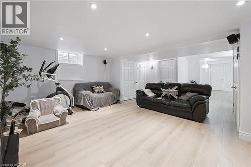 Spacious room featuring light wood-finish flooring, recessed lighting, and white walls - 11 Patton Drive, Cambridge, ON - Indoor