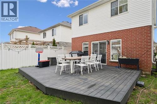 Expansive multi-level composite deck offering direct access to the interior via sliding glass doors - 11 Patton Drive, Cambridge, ON - Outdoor With Deck Patio Veranda With Exterior