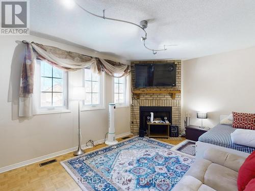 11 Iles Street W, Ajax, ON - Indoor Photo Showing Living Room With Fireplace