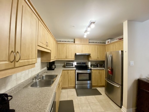 Kitchen - 107-945 Rue Muir, Montréal (Saint-Laurent), QC - Indoor Photo Showing Kitchen With Double Sink