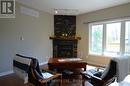 25 Rue Vanier, Tiny, ON  - Indoor Photo Showing Living Room With Fireplace 
