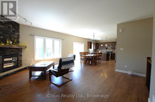 25 Rue Vanier, Tiny, ON - Indoor Photo Showing Living Room With Fireplace