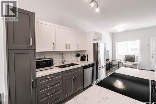 451 L Avenue S, Saskatoon, SK - Indoor Photo Showing Kitchen With Stainless Steel Kitchen With Double Sink