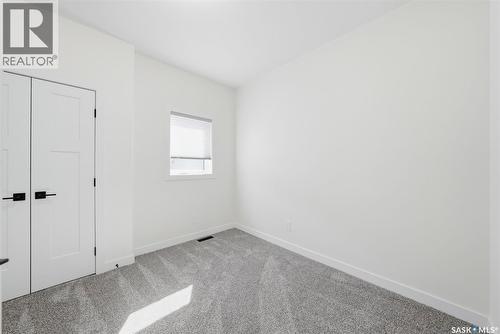709 Sarazen Drive, Warman, SK - Indoor Photo Showing Other Room