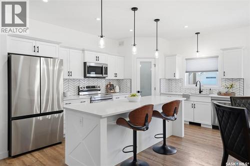709 Sarazen Drive, Warman, SK - Indoor Photo Showing Kitchen With Upgraded Kitchen