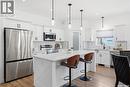 709 Sarazen Drive, Warman, SK  - Indoor Photo Showing Kitchen With Upgraded Kitchen 
