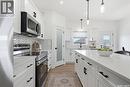 709 Sarazen Drive, Warman, SK  - Indoor Photo Showing Kitchen With Upgraded Kitchen 