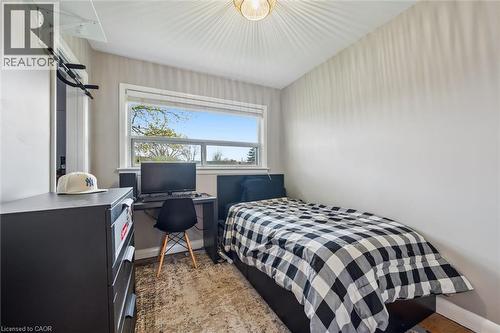 Interior room featuring light-toned walls and a large window - 154 Oriole Street, Waterloo, ON - Indoor Photo Showing Bedroom